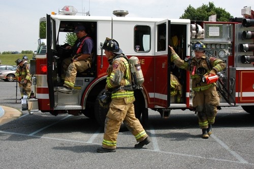 Engine 21-2 arrives at a building fire at the Rising Sun High School.